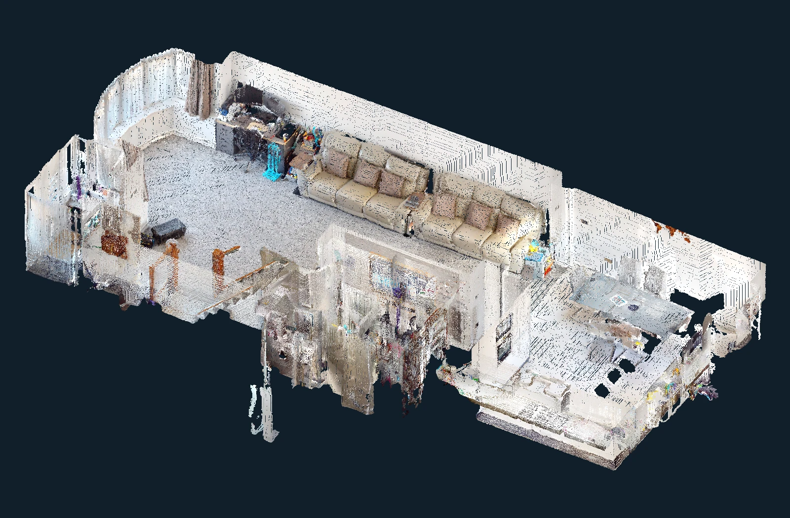 Coloured point-cloud cutaway of a scanned home, showing the living room, kitchen and internal layout